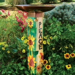 Peace Pedestal Bird Bath- Retired Design -Bird Haven Shop Peace Bird Bath in garden